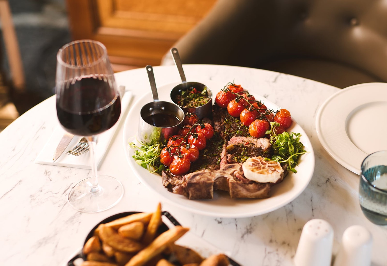 Savour your meal, perfectly complemented by a glass of wine.