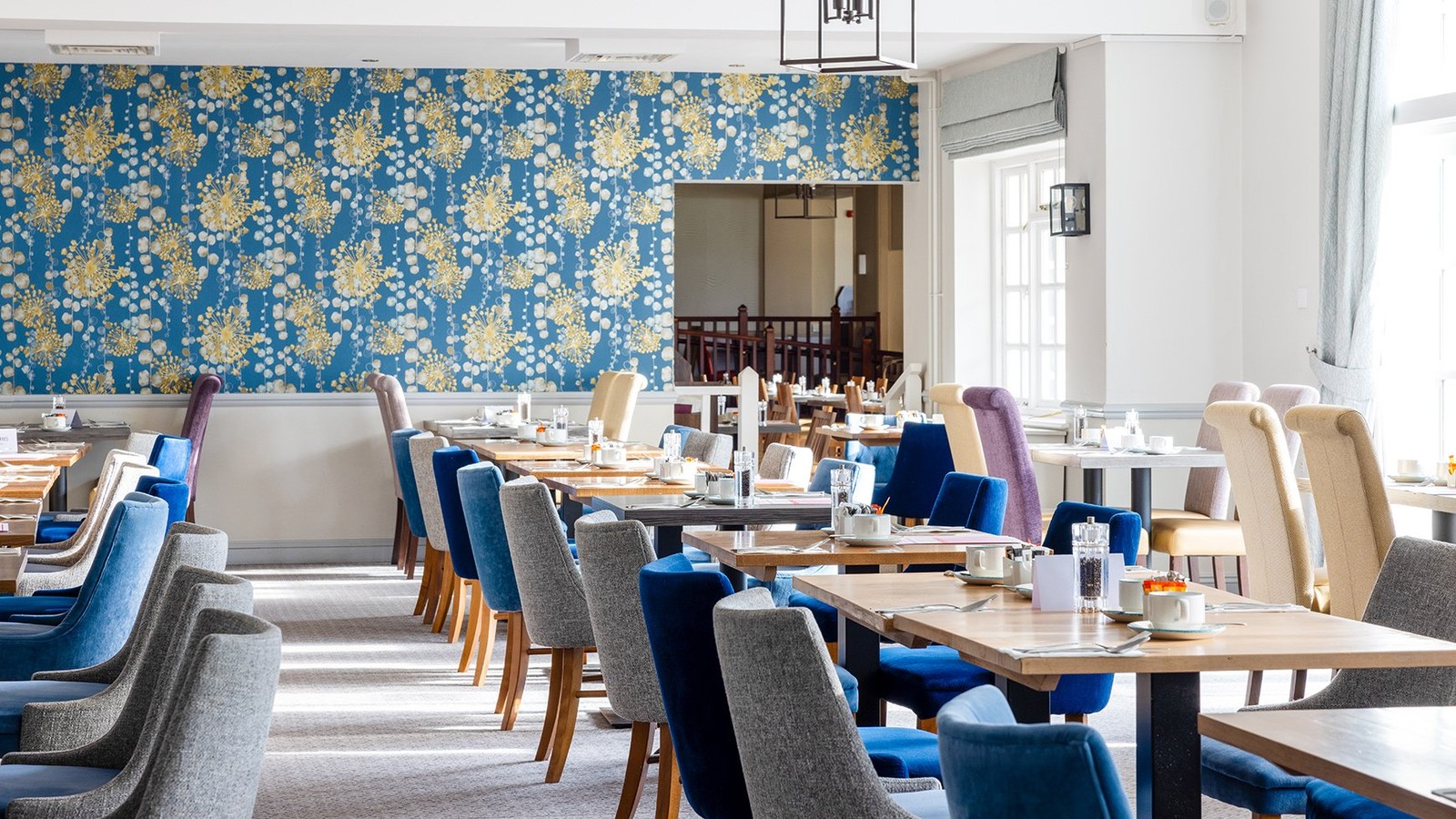 At the Four Tides Restaurant, sunlight pours through wide windows, infusing the space with a bright, cheerful coastal vibe - the ideal backdrop for a leisurely breakfast or a relaxed dinner.