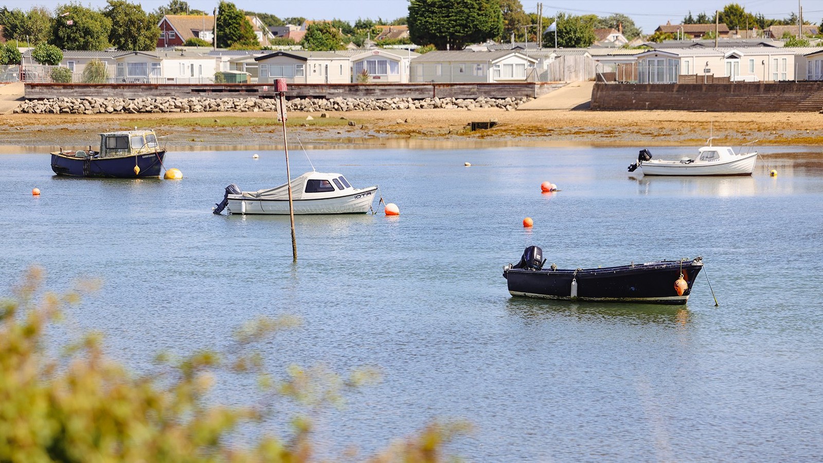 The grounds are full of picturesque views to discover, including this peaceful scene of boats on the lake.
