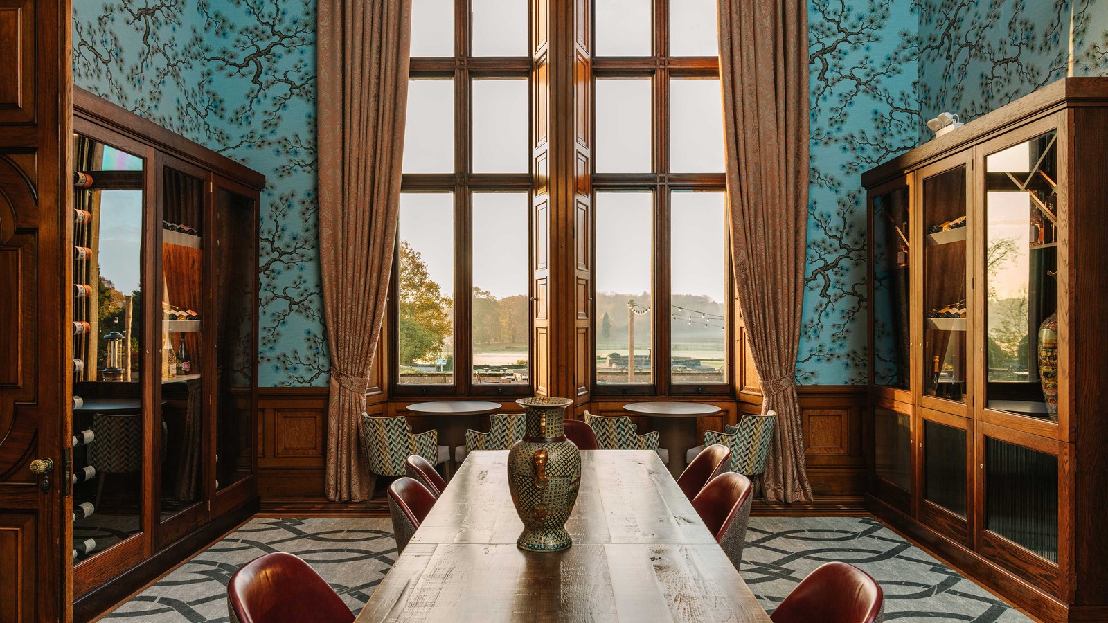Through the windows of our historic Wine Room, the gardens stretch in quiet grandeur.
