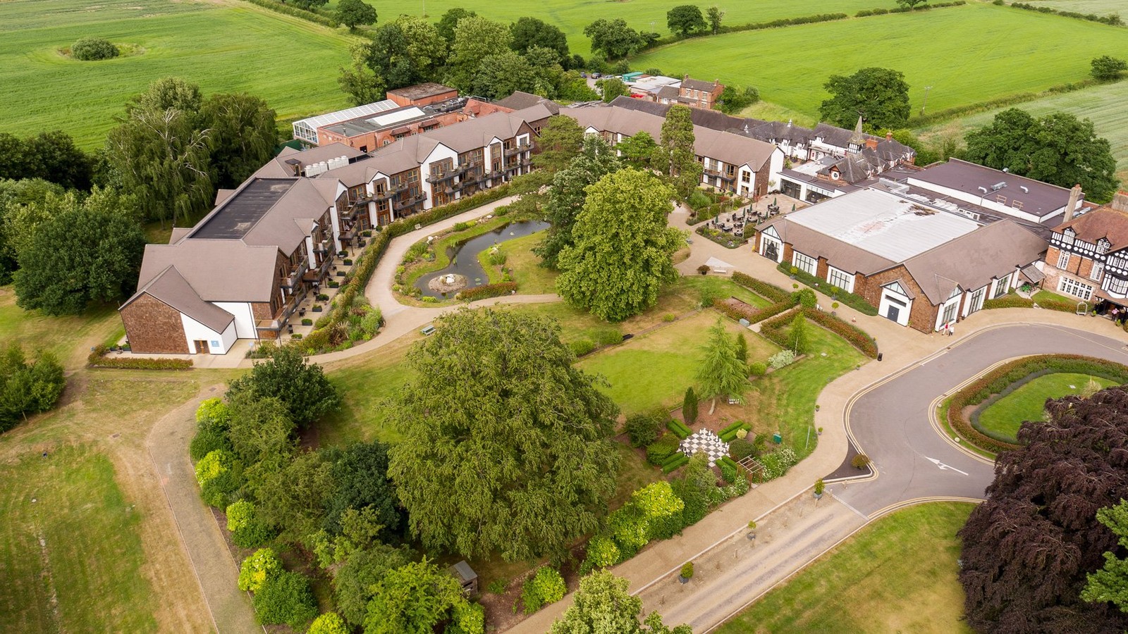 The grounds of Alvaston Hall are full of charm, with beautiful gardens and pathways around them, perfect for a leisurely stroll.