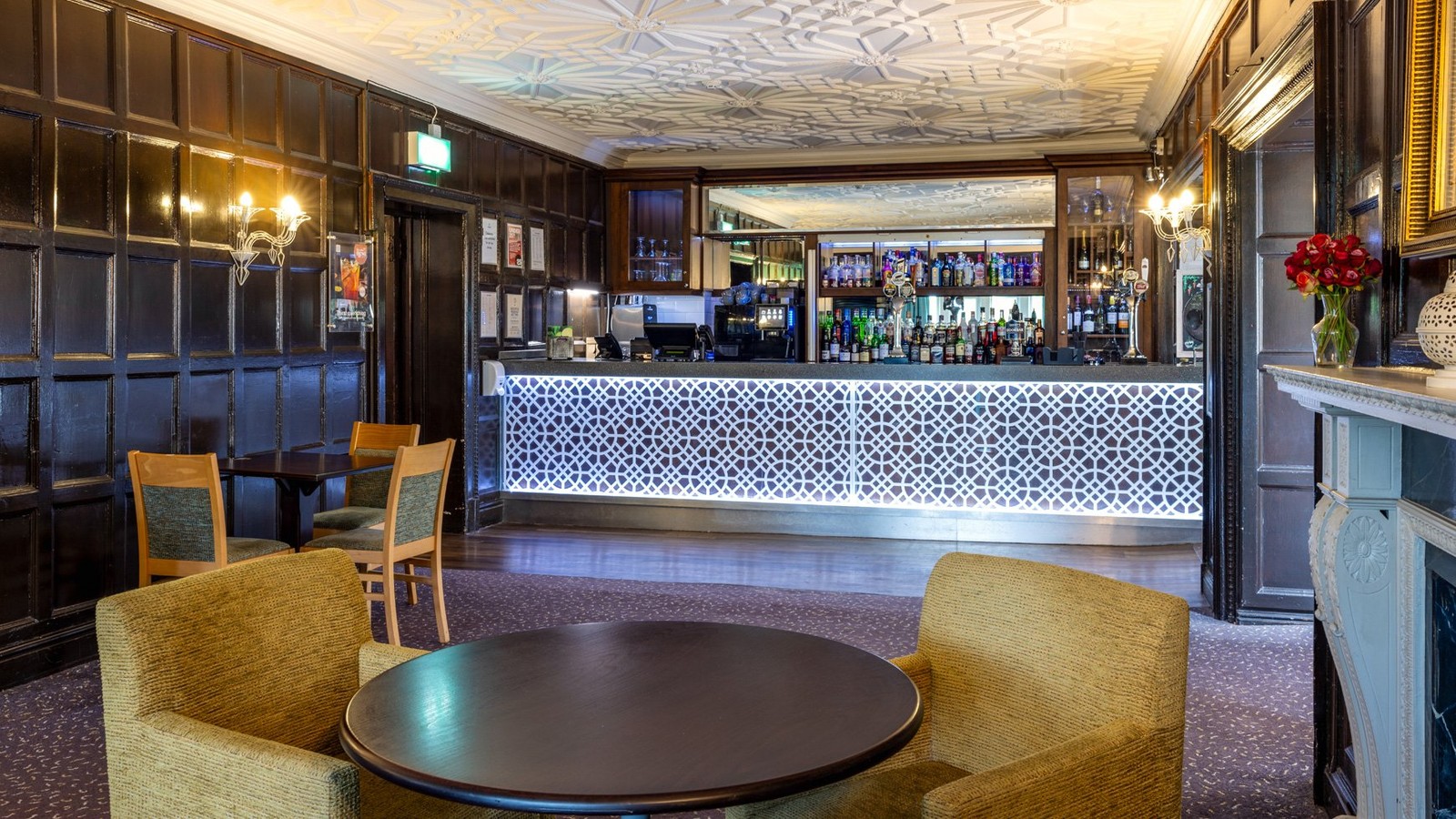 Step into our cosy bar, with glowing counters and stylish wooden details that add a whole lot of character.