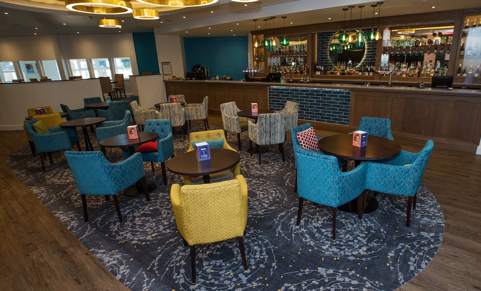 Head to the bar, where every corner invites you to sit back, relax, and soak up the atmosphere. With cosy chairs and stylish tables, it’s the perfect space for good times and great company.
