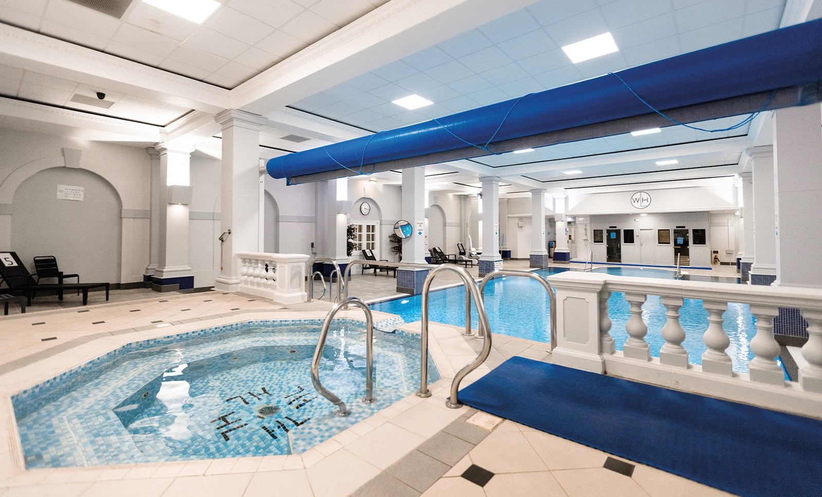 Relax in the indoor pool at Holme Lacy House. Perfect for a leisurely swim or a refreshing escape.