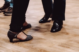 People's feet as they dance together