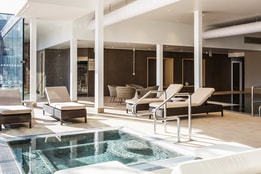 The stables spa at Studley Castle, featuring calming décor and wellness amenities for relaxation.