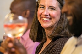 Guests at a Warner Hotel enjoying drinks at the bar
