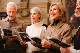 A group of carol singers at a Warner Hotel