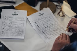 Close up of a quiz sheet being marked after a quiz hosted by the entertainment team at Littlecote House Hotel