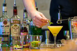 Bar team demonstrating in the cocktail making class