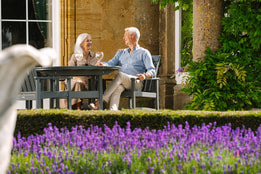 Couple enjoying each others company drinking gin