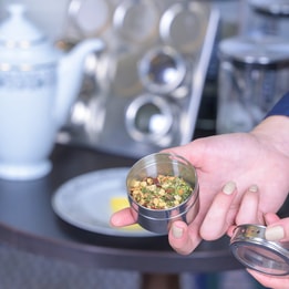 A pot of tea being shown as part of the tea tasting experience