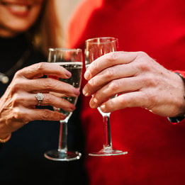 Couple enjoying a glass of fizz