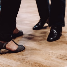 People's feet as they dance together