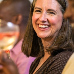 Guests at a Warner Hotel enjoying drinks at the bar