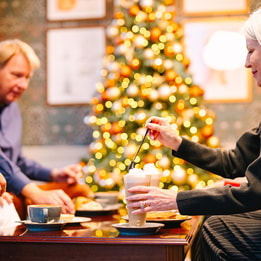 Guests in the Coffee Nest enjoying hot drinks together