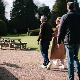 people walking on hotel grounds