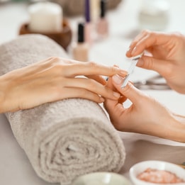 Woman's nails being filed