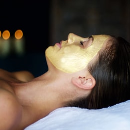Woman's face from side on with a face mask on