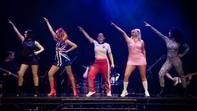 Spice Girls Experience performing on stage