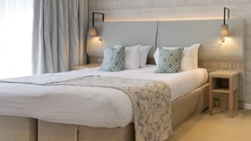 Double bed inside hotel room