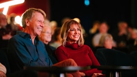 Couple enjoying an evening show