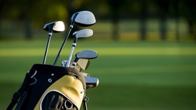 Golf clubs on green