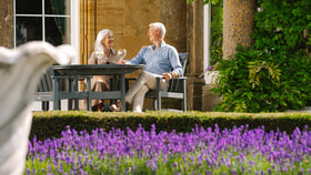 Couple enjoying each others company drinking gin