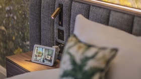 Bedside table with an Alexa device on