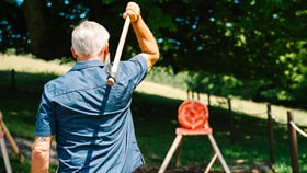 Guest enjoying axe throwing