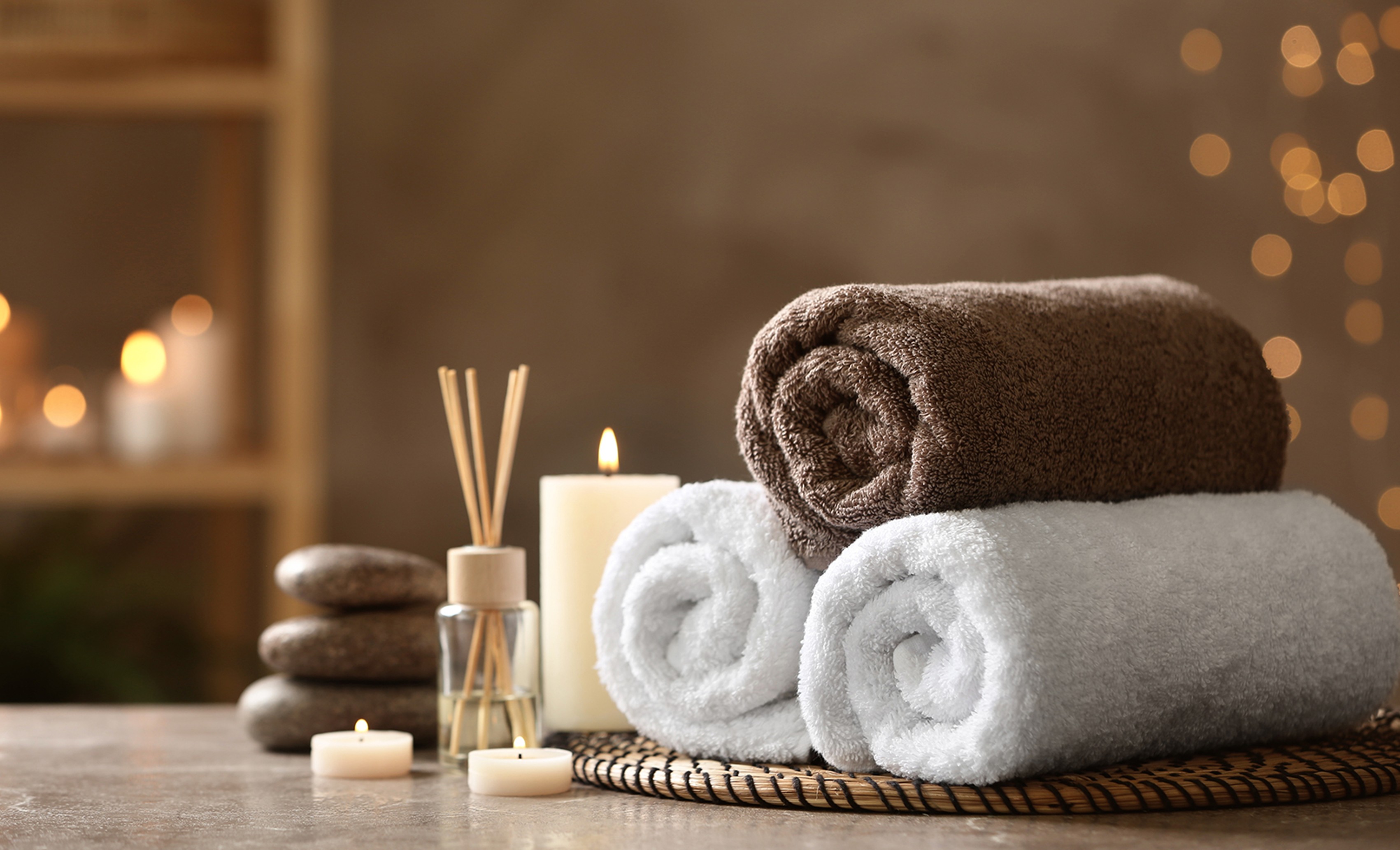 Towels and candles create a relaxed atmosphere at the spa