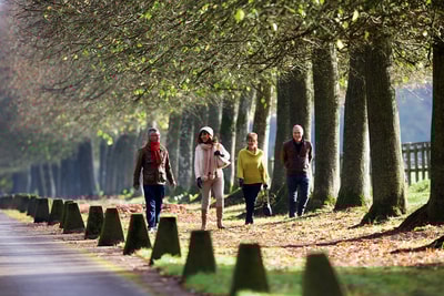 Group walking on the Littlecote grounds