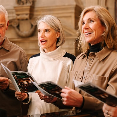 A group of carol singers at a Warner Hotel
