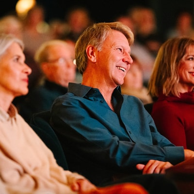 Guests enjoying an evening show