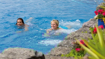 People swimming the Sinah Warrens outdoor pool