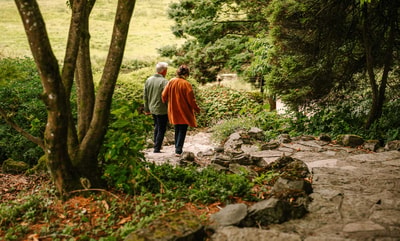 Couple holding hands discovering the grounds at Cricket st. Thomas