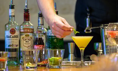 Bar team demonstrating in the cocktail making class
