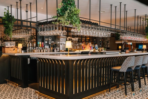 Elegant spaces, expertly poured drinks and the perfect setting to unwind together.