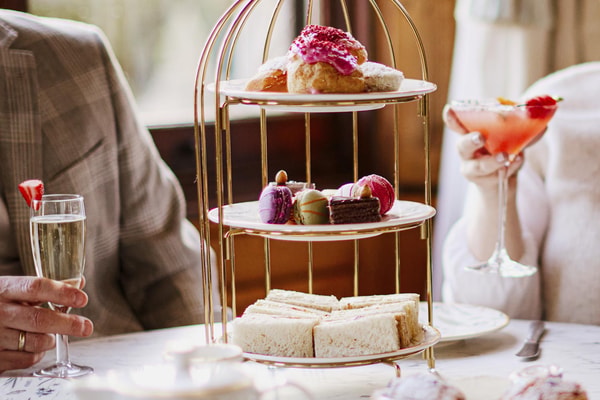 A refined afternoon tea selection of freshly prepared sweet and savoury bites, with the option to add a glass of bubbly for added indulgence.