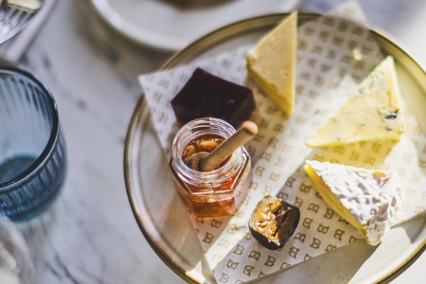 During your stay, savour a curated cheese board in the elegant Blue Room, thoughtfully prepared.
