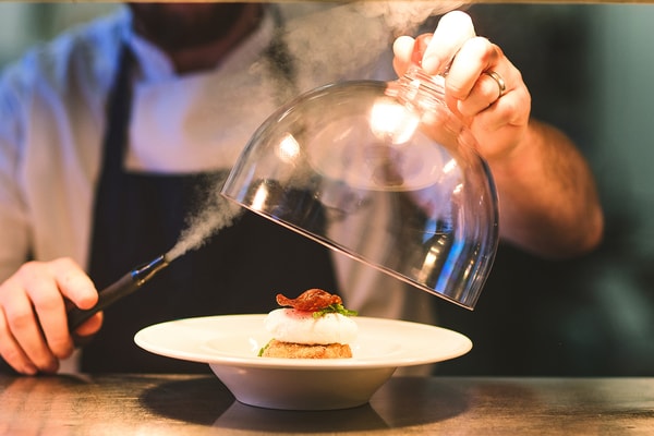 Smoked haddock fishcake, perfectly prepared for an elevated dining experience.