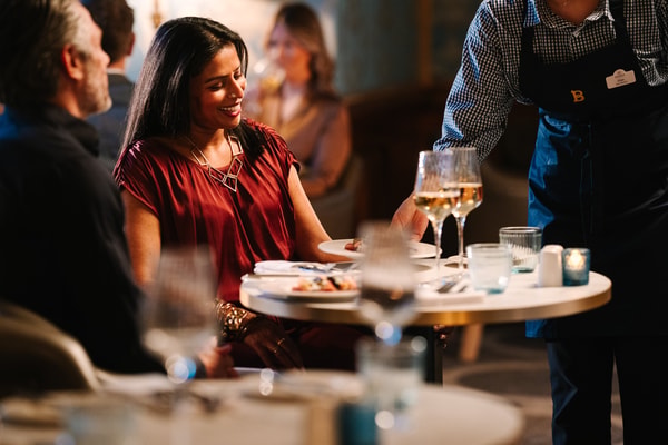Step into The Blue Room, where elegance meets modern dining in a beautifully designed setting.