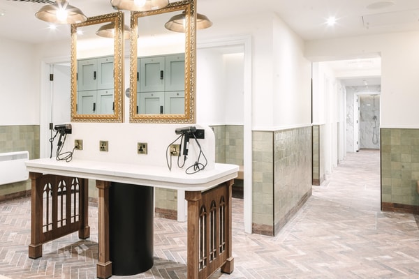 Modern elegance meets classic charm in these new changing rooms. The warm tones and thoughtful design invite relaxation.