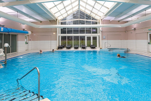 Take a refreshing dip in our inviting indoor pool, perfect for a relaxing swim any time of day.