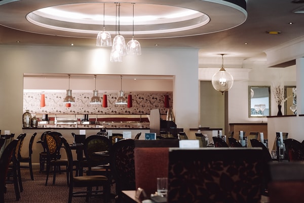 Enjoy buffet-style breakfast and dinner at Treetops Restaurant, with plenty of options to suit every taste.