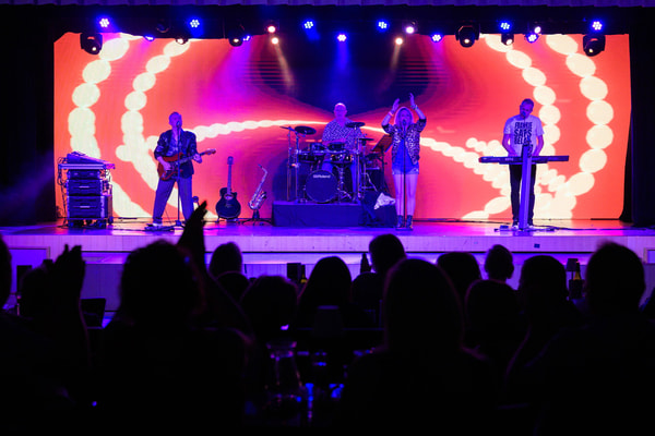 Imagine being silhouetted in the glow of the stage, sharing in a night of unforgettable entertainment at Studley Castle.