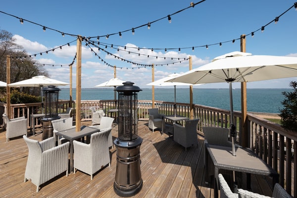 Sit back, unwind, and enjoy breathtaking coastal views from our spacious terrace.