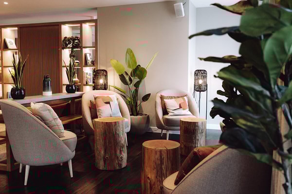 Muted decor and soft lighting create a really relaxing and inviting atmosphere in the Spa Lounge.