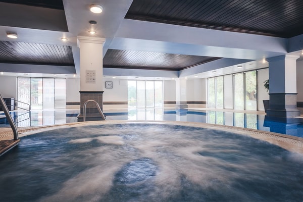 Sink into the soothing whirlpool bath and let your worries melt away.