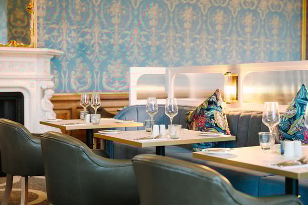 Your seat at The Blue Room awaits, with every detail prepared for a memorable meal.